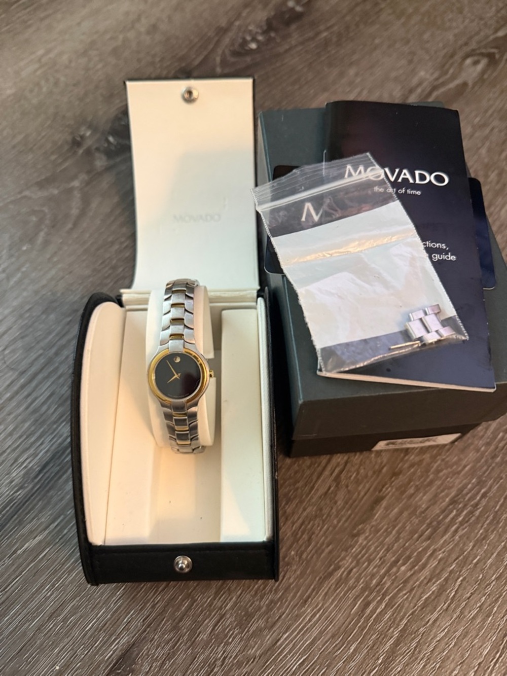Movado Two-Tone Bracelet Watch with Black Dial and Gold Bezel